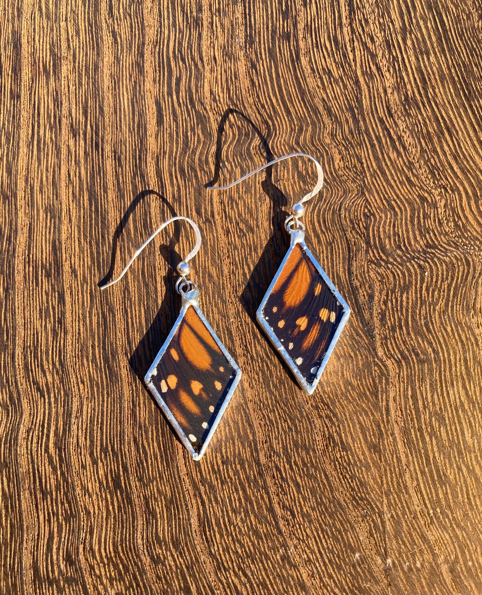 Monarch orange velvety diamond earrings